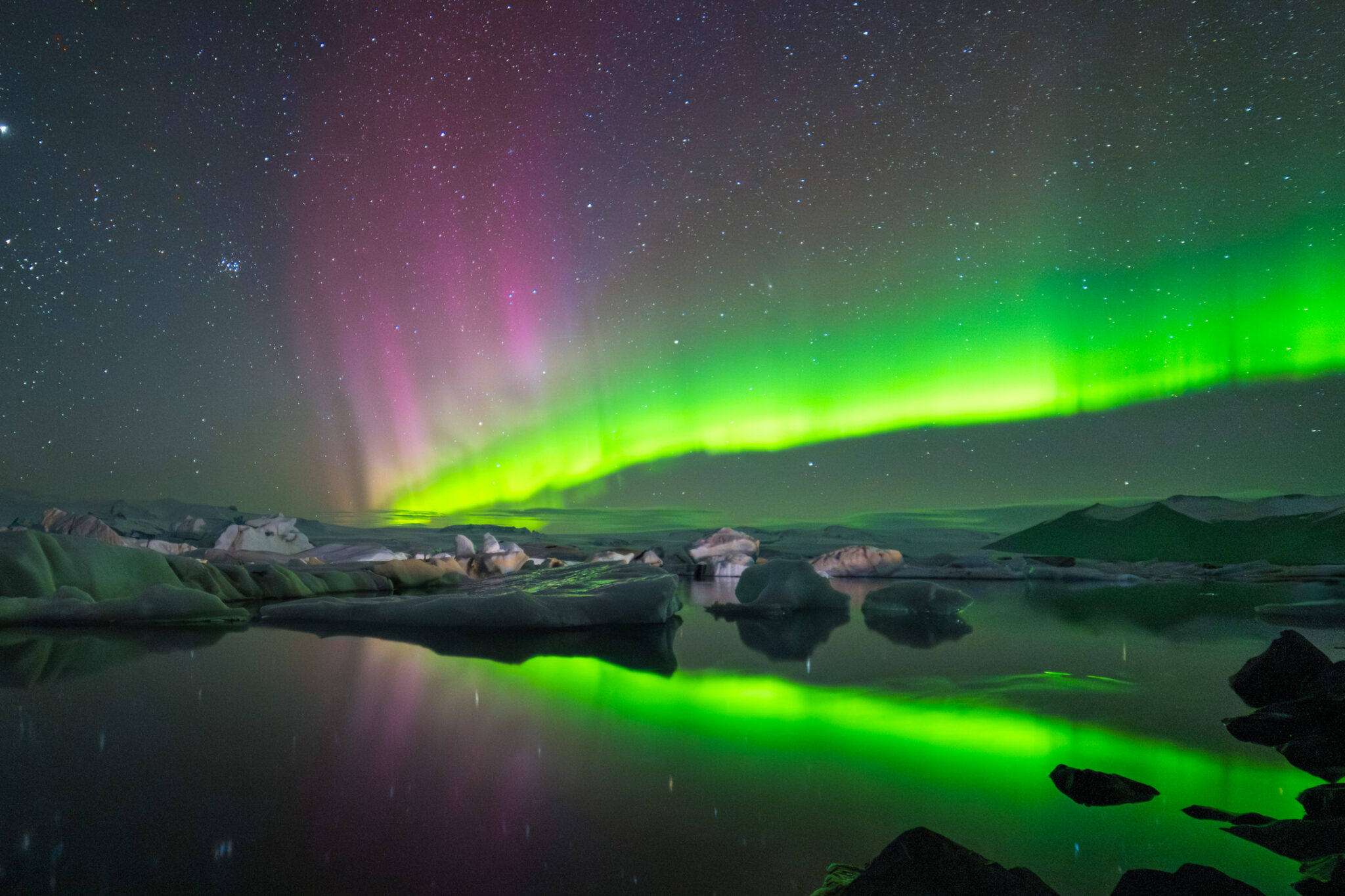 Landscape Gallery 1 Vibrant northern lights over water